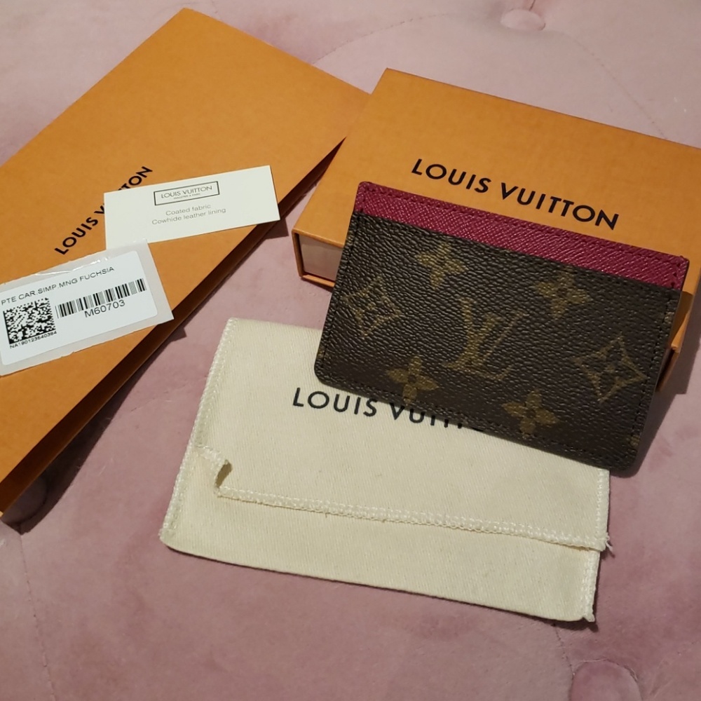Louis Vuitton card holder in fuschia
